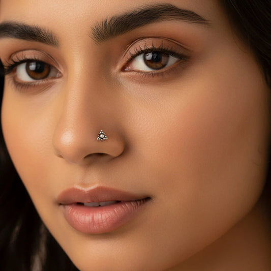 Close-up of a woman's face with a nose ring, by silver world - best silver shops in Delhi