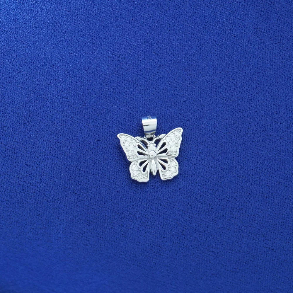 Silver butterfly pendant on a blue background