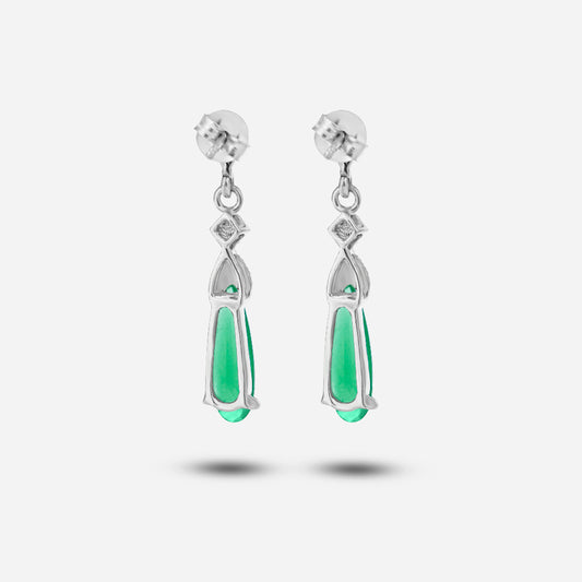 Pair of silver earrings with green teardrop-shaped stones on a white background