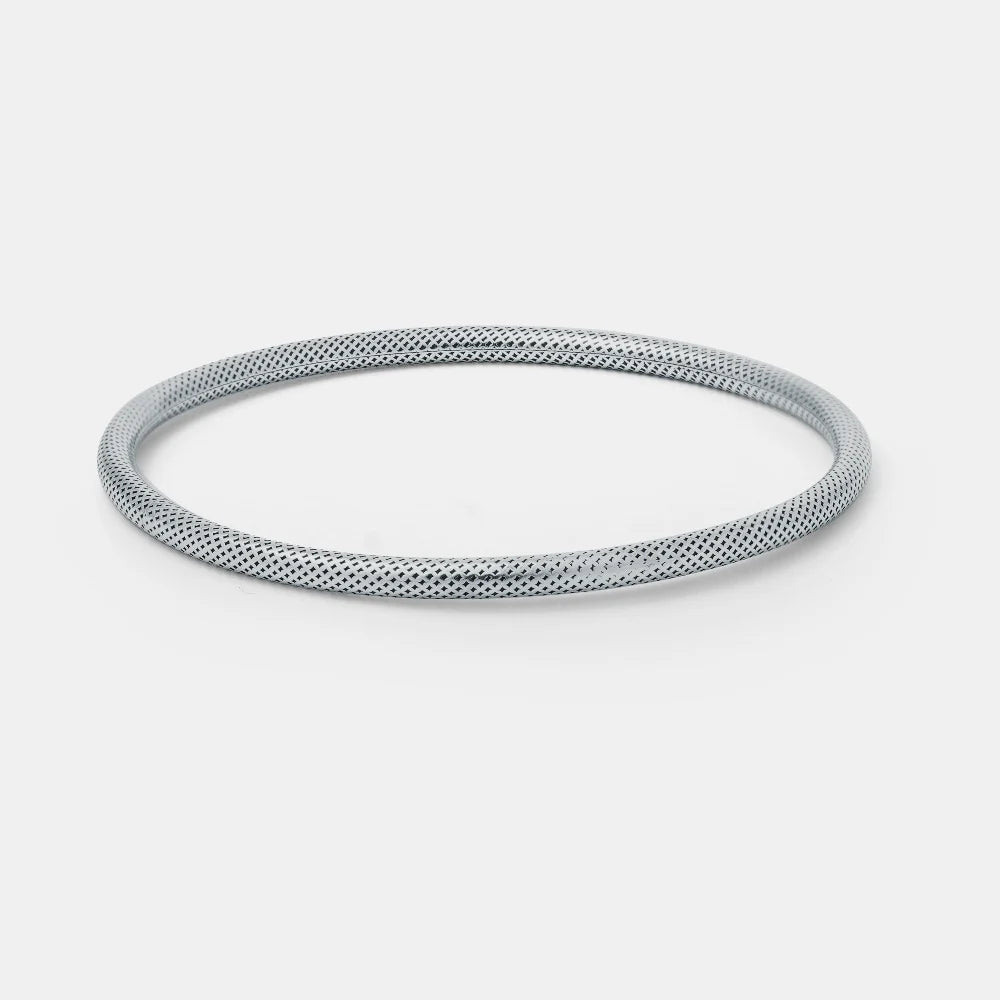 Hollowpipe Bangle Silver on a light gray background