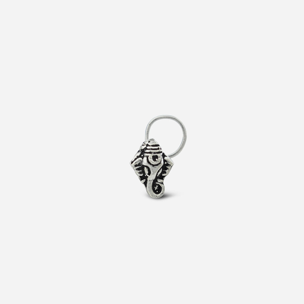 Silver Ganpati Nose pin on a white background by silver world
