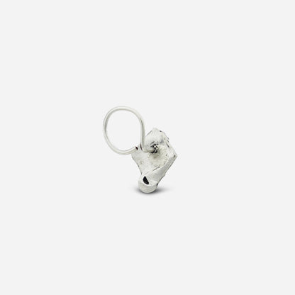 Silver Ganpati Nose pin on a white background by silver world