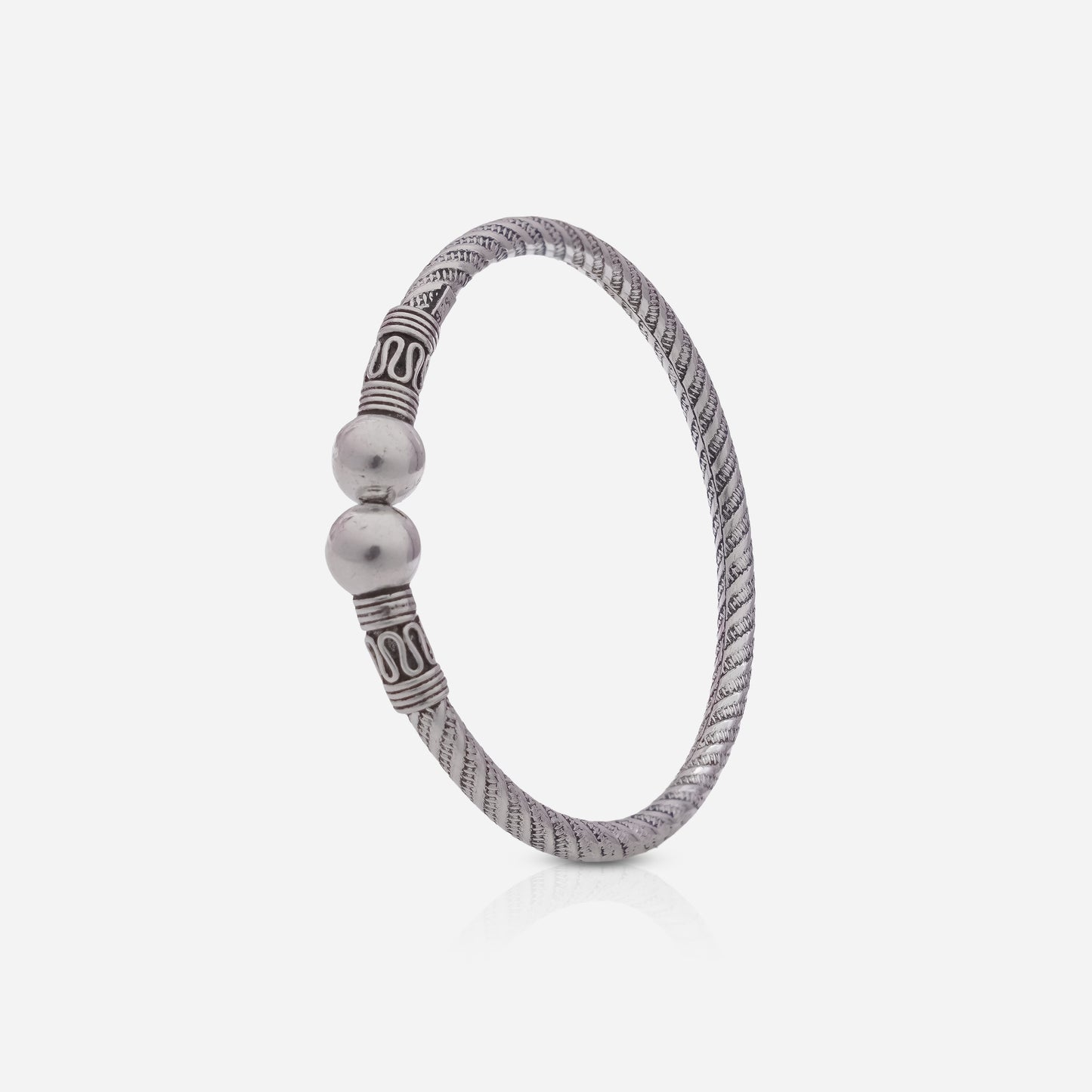 Silver bracelet with beads on a white background