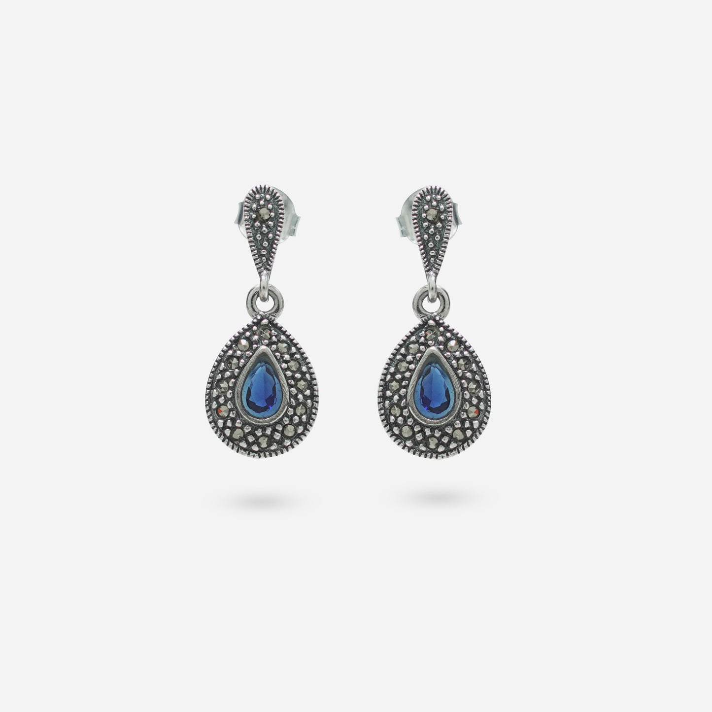 925 Sterling Silver Blue Stone Dangler Earrings for women featuring Swiss Marcasite accents and a handcrafted heritage oxidized finish.