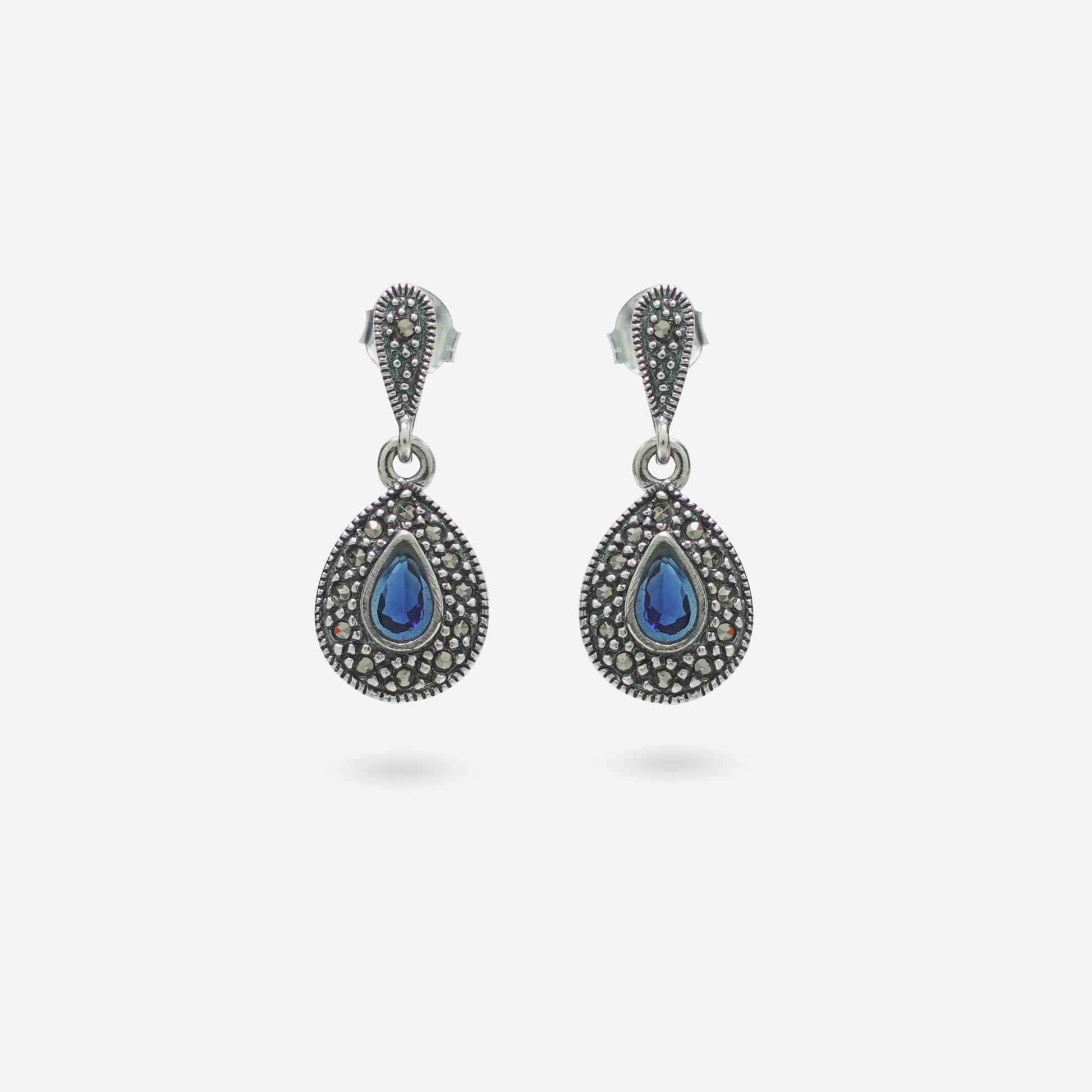925 Sterling Silver Blue Stone Dangler Earrings for women featuring Swiss Marcasite accents and a handcrafted heritage oxidized finish.