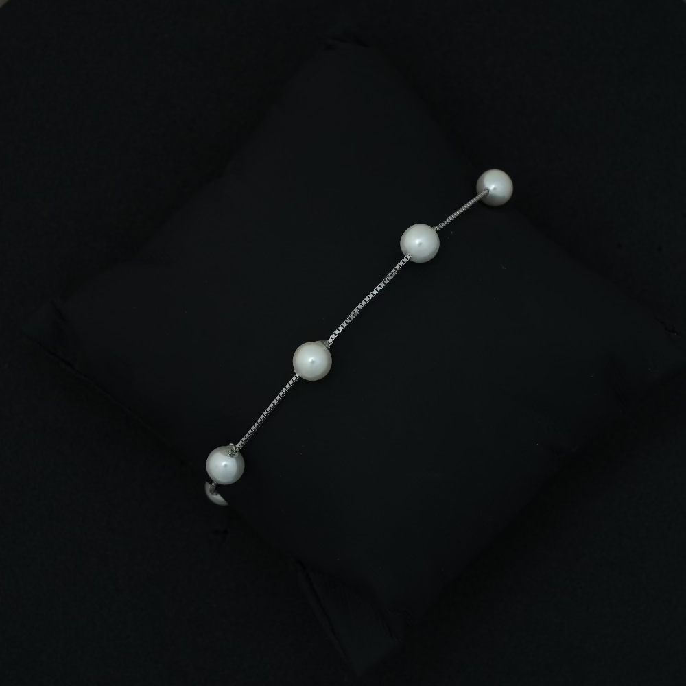 Pearl barrette on a black background