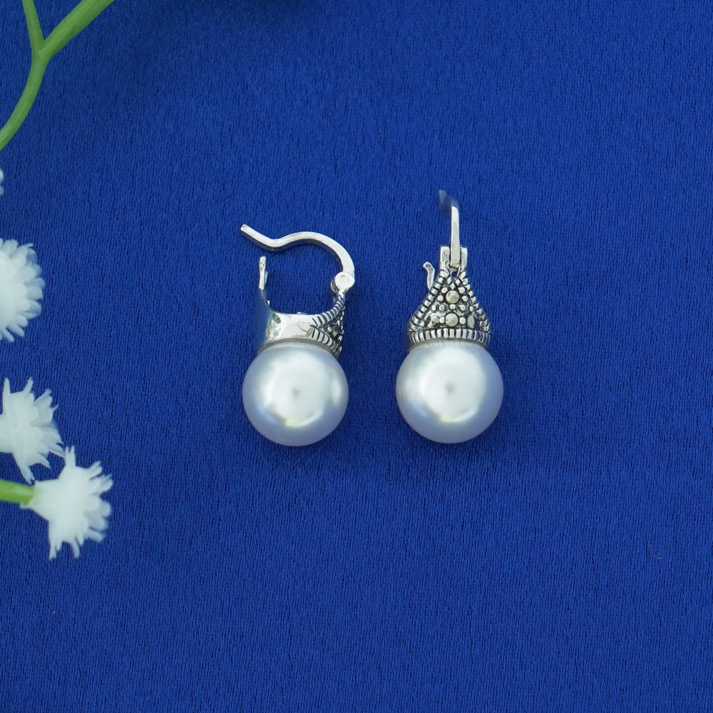 Pearl earrings with marcasite drops by Silver World.
