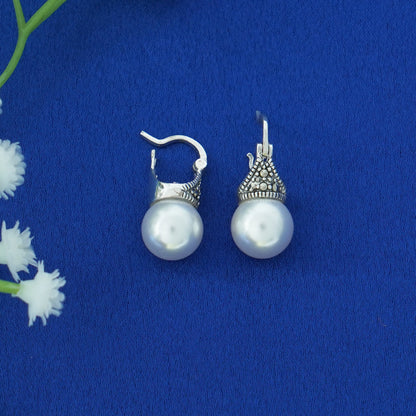 Pearl earrings with marcasite drops by Silver World.