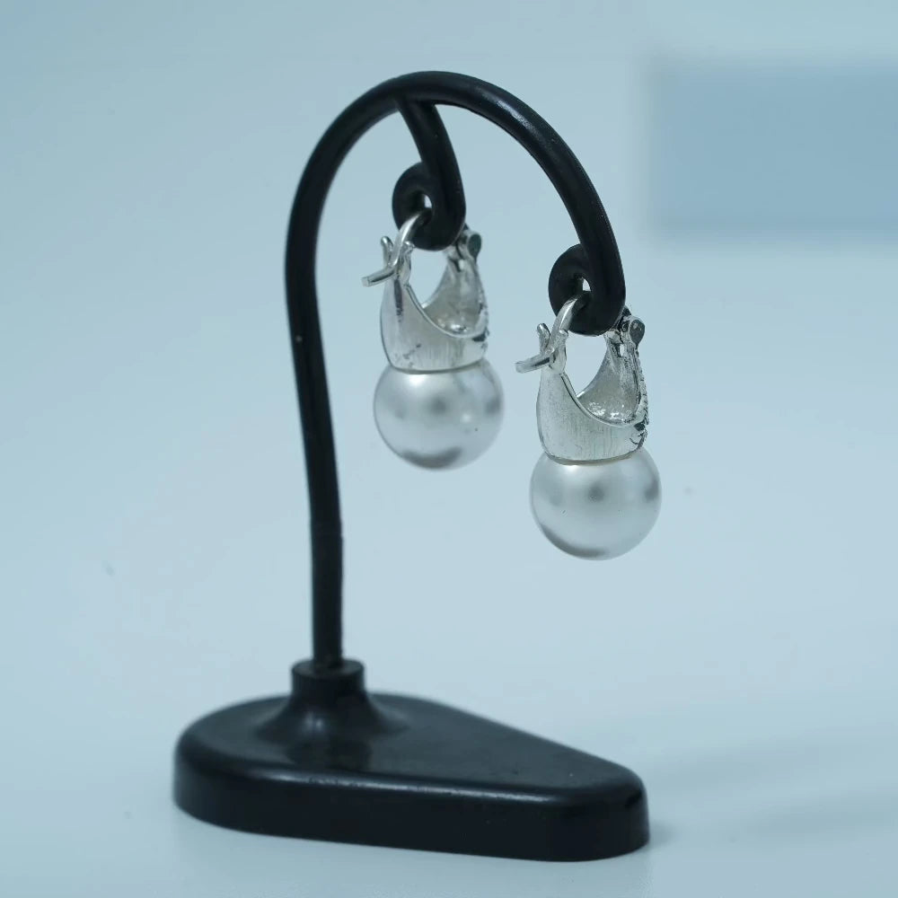 Pearl earrings with marcasite drops by Silver World.