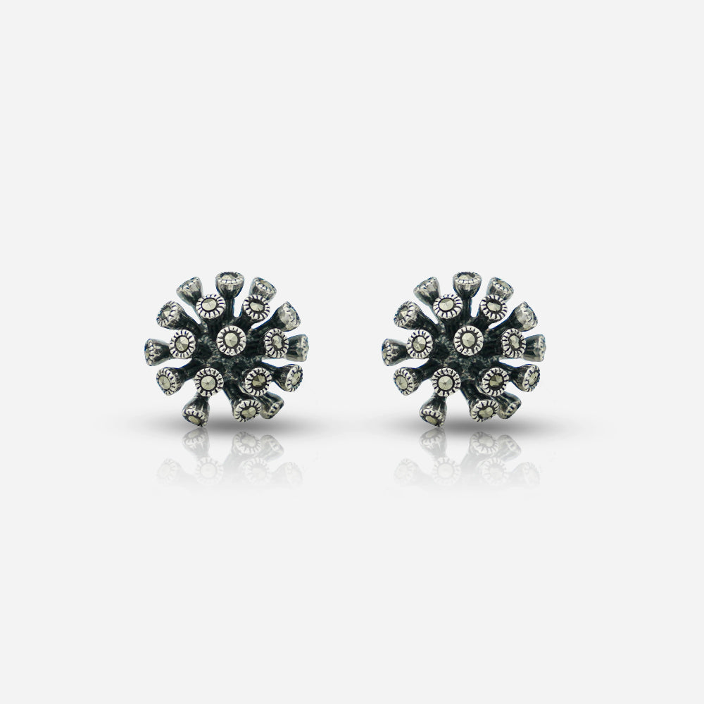 Pair of silver floral earrings by Silver World - best silver shops in Delhi.
