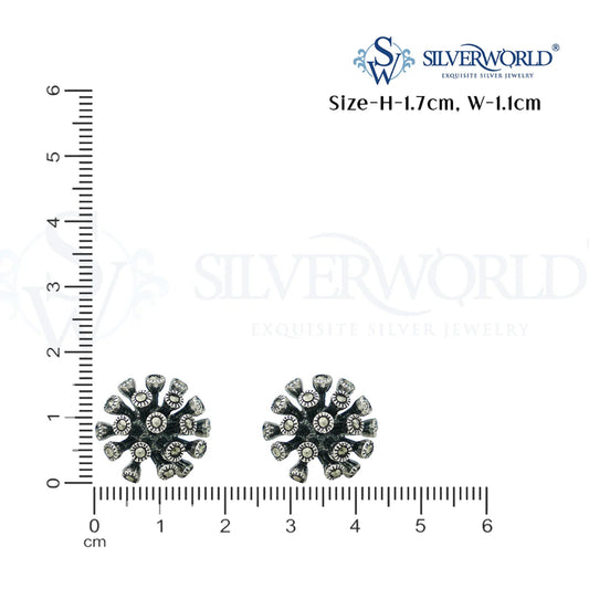 Silver earrings with a ruler for size reference by Silver World - best silver shops in Delhi.