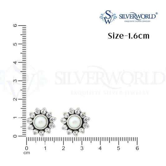 Silver earrings with pearl-like centers on a white background with measurement scale and 'SilverWorld' branding.