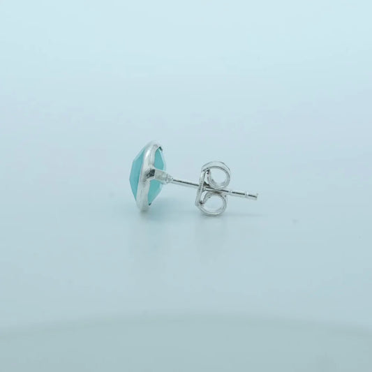 Pair of turquoise round stud earrings by Silver World.