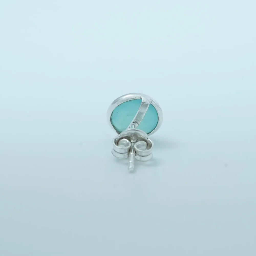 Pair of turquoise round stud earrings by Silver World.