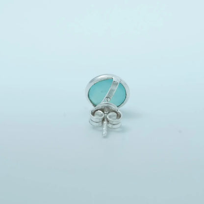 Pair of turquoise round stud earrings by Silver World.
