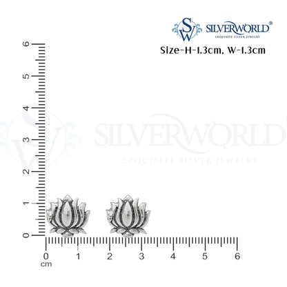Silver earrings with a ruler for scale on a white background, featuring the SilverWorld brand.
