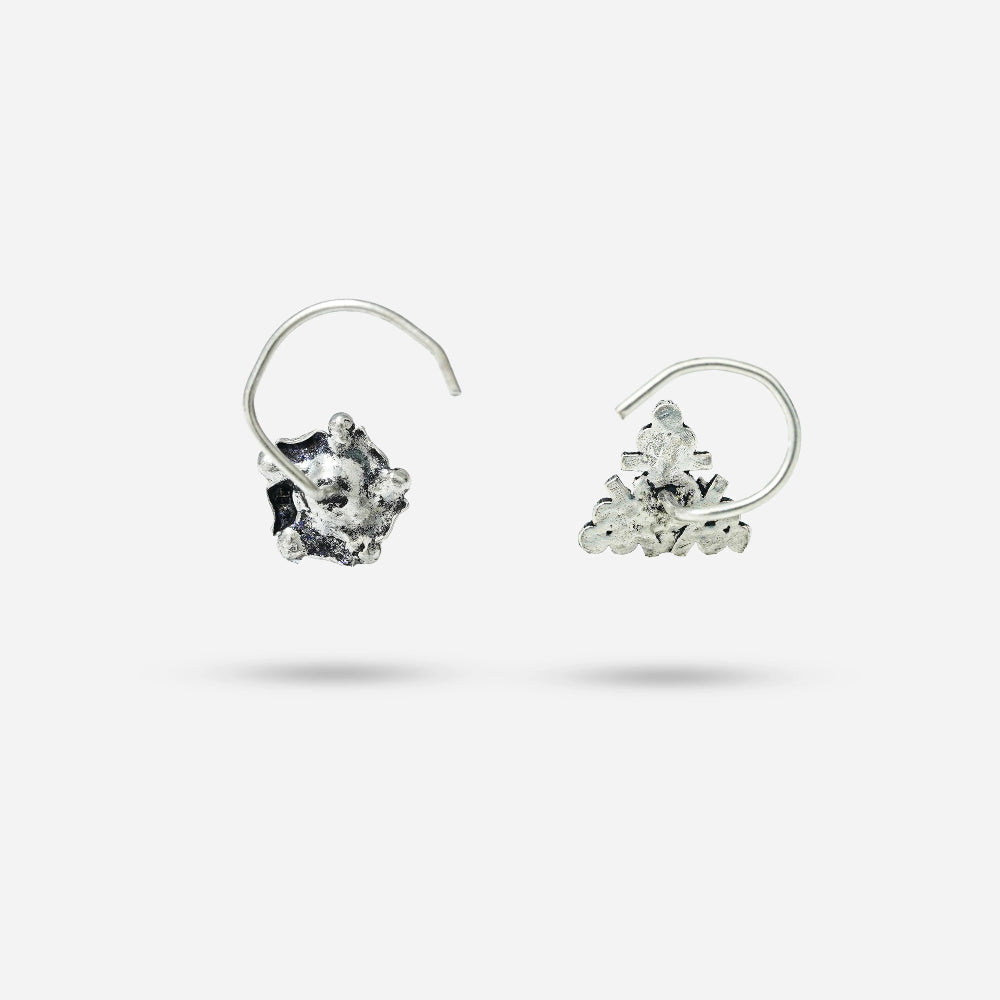 Pair of silver hoop earrings with embedded stones by silver world - best silver shops in Delhi