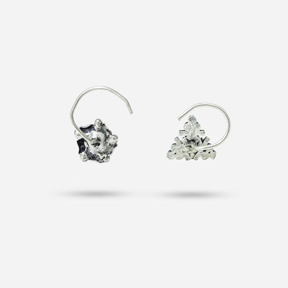 Pair of silver hoop earrings with embedded stones by silver world - best silver shops in Delhi