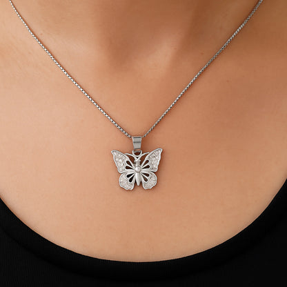Silver butterfly necklace on a mannequin