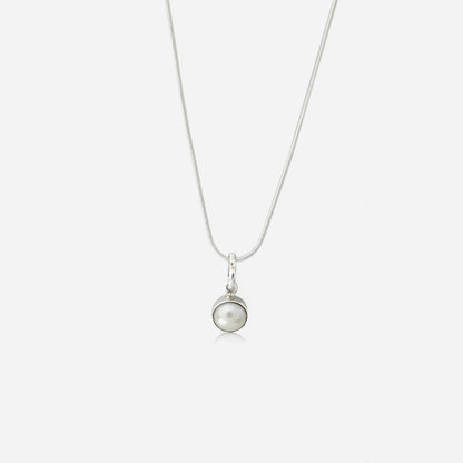 a silver necklace with a pearl pendant by Silver World.