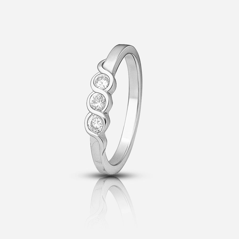 Silver ring with three diamonds on a white background