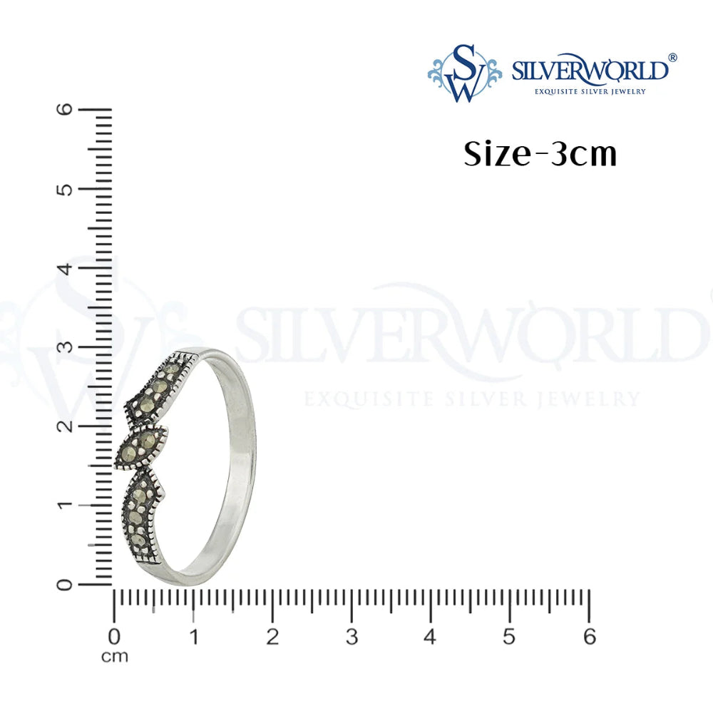 Silver ring with gemstones next to a ruler by Silver World - Best silver shops in Delhi!
