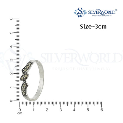 Silver ring with gemstones next to a ruler by Silver World - Best silver shops in Delhi!
