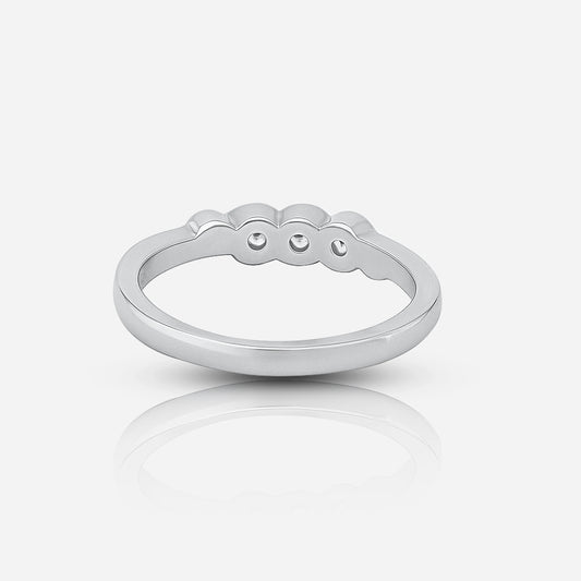 Silver ring with engraved design on a white background