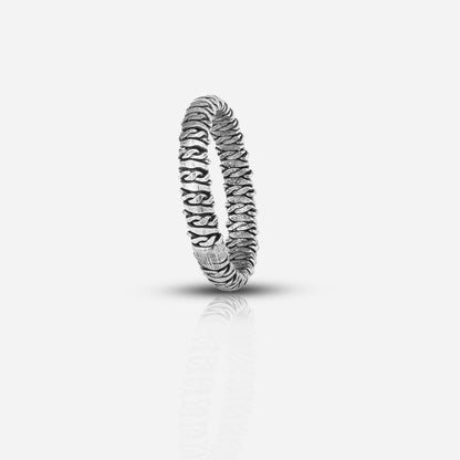 Silver ring with intricate design 