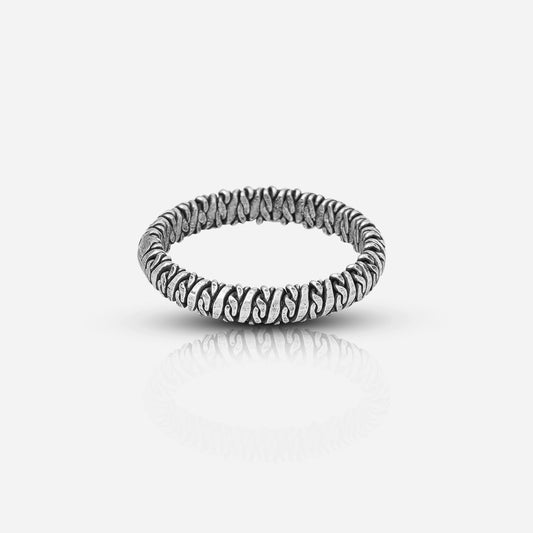 Silver ring with a zebra stripe pattern 